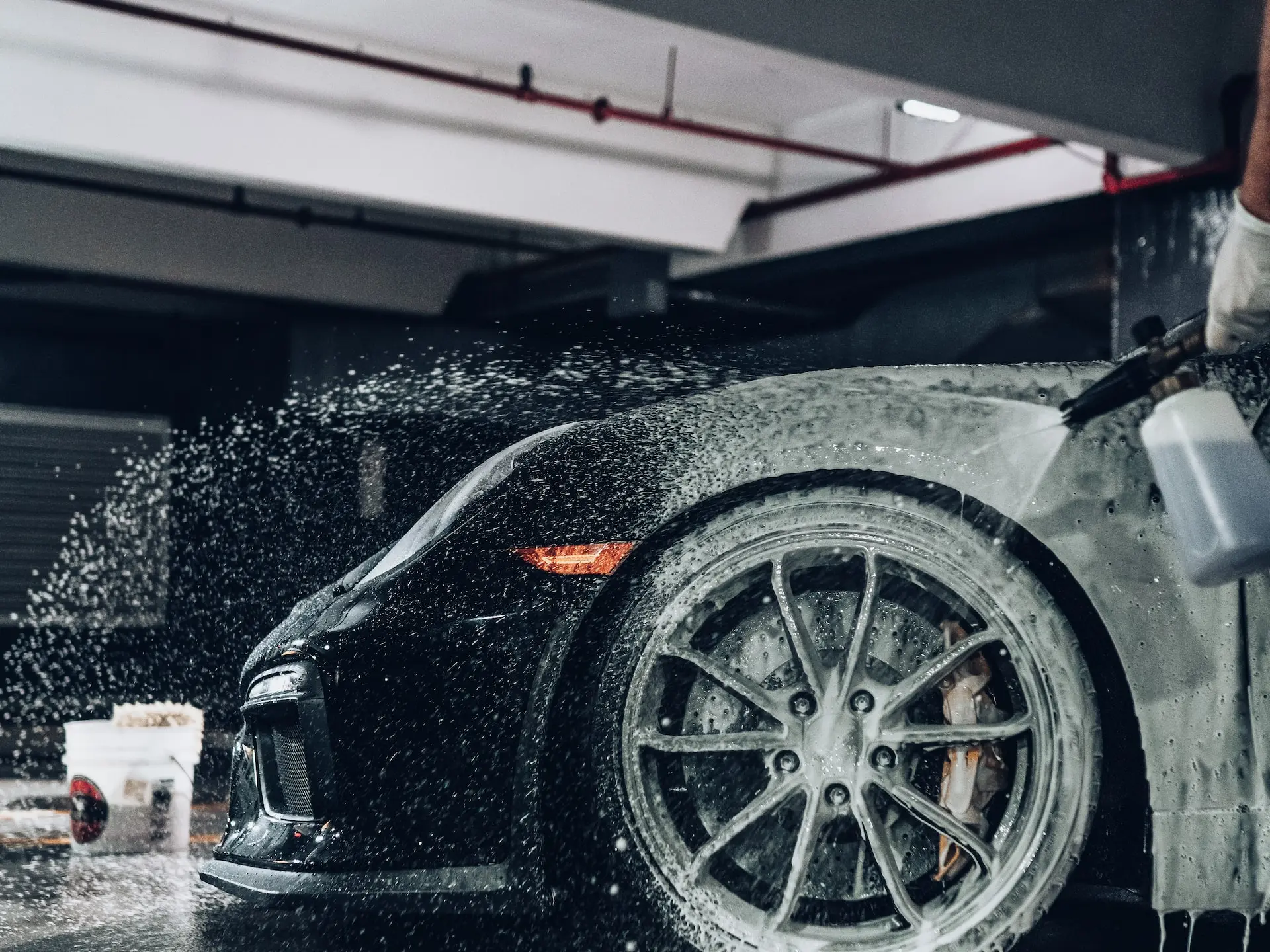 black car with white plastic cup on top